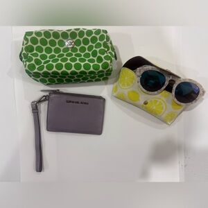 Set of wristlet and makeup bag . Michael Kors